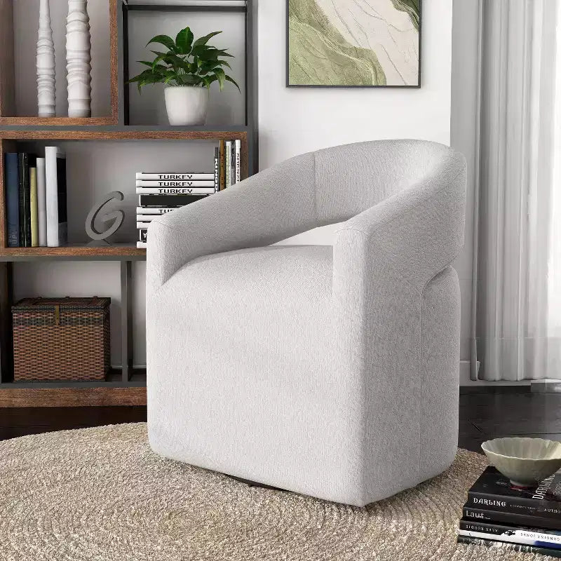 Fauteuil tonneau pivotant moderne en bouclé avec dossier ouvert